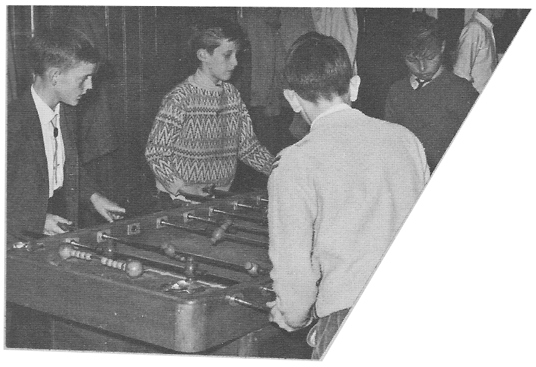 Playing Foosball Soccer Table Game in Sapiniere recreation Room  Villa Saint Jean International School  1964 Yearbook Le Chamois