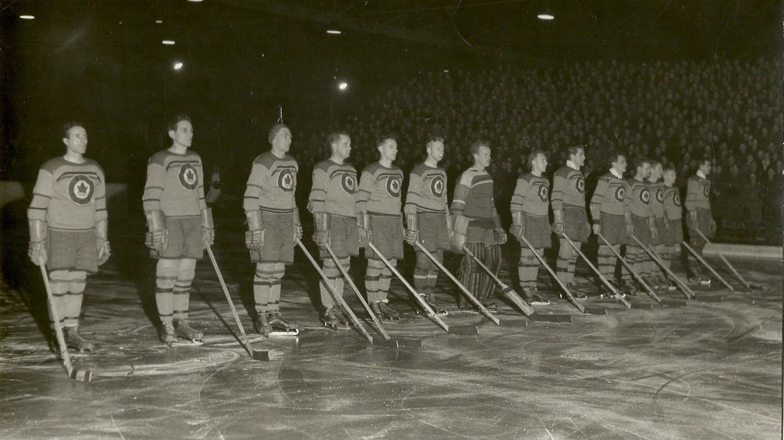 Photo: RCAF Flyers Line Up at Stockholm Sweden post Olympic Exhibition Game