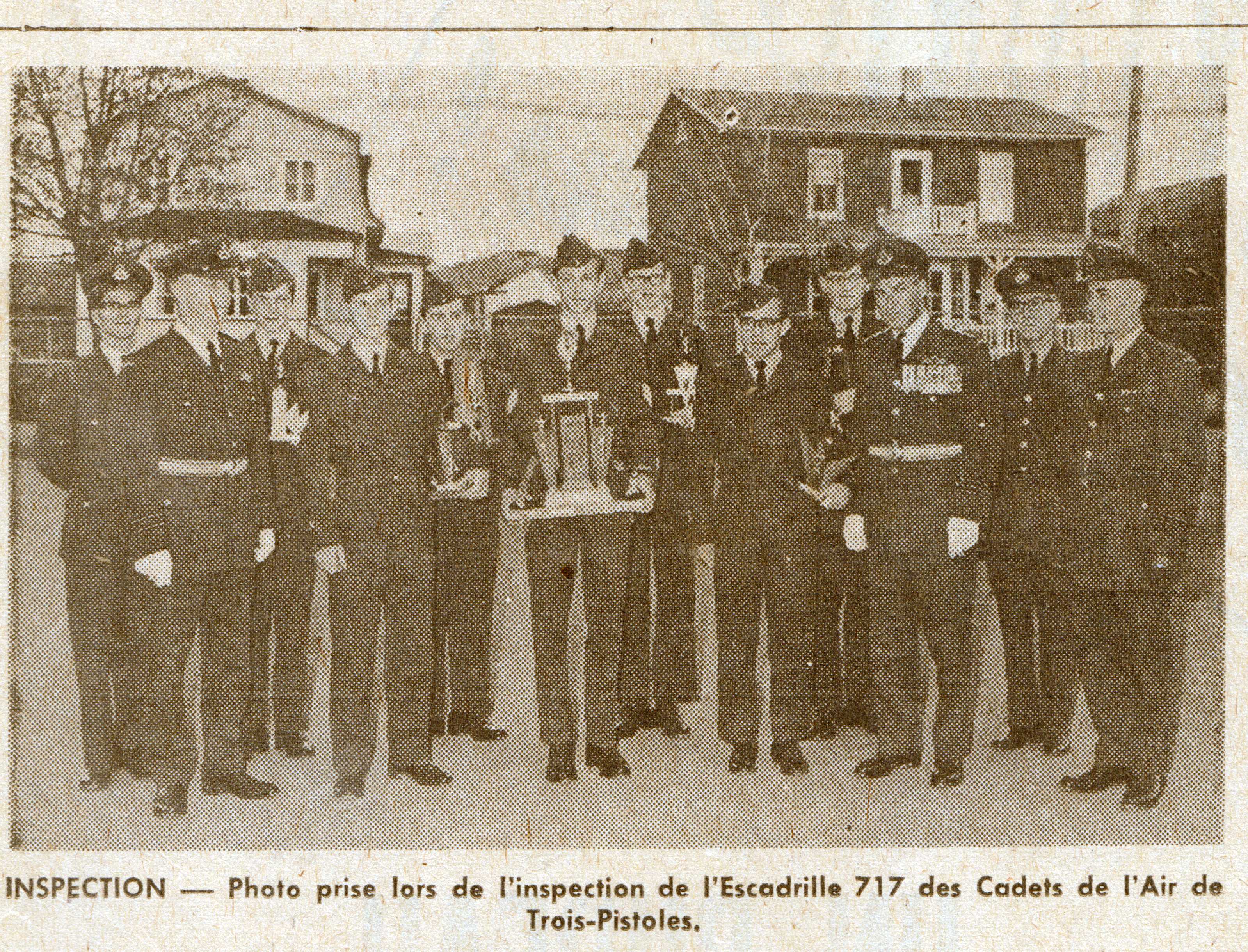 Photo: Newspaper photo of W/C Hubert Brooks with Air Cadets in Trois Pistoles 