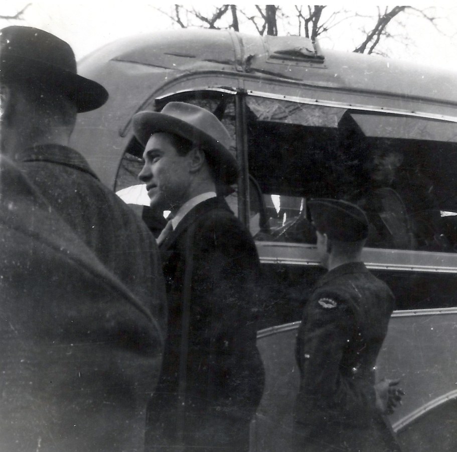 Photo:  RCAF Flyer Wally Halder Surveys Flyer Bus After Accident in Southampton